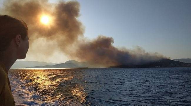 Sisam Adası`nda başlayan yangın tatil köylerini tehdit ediyor